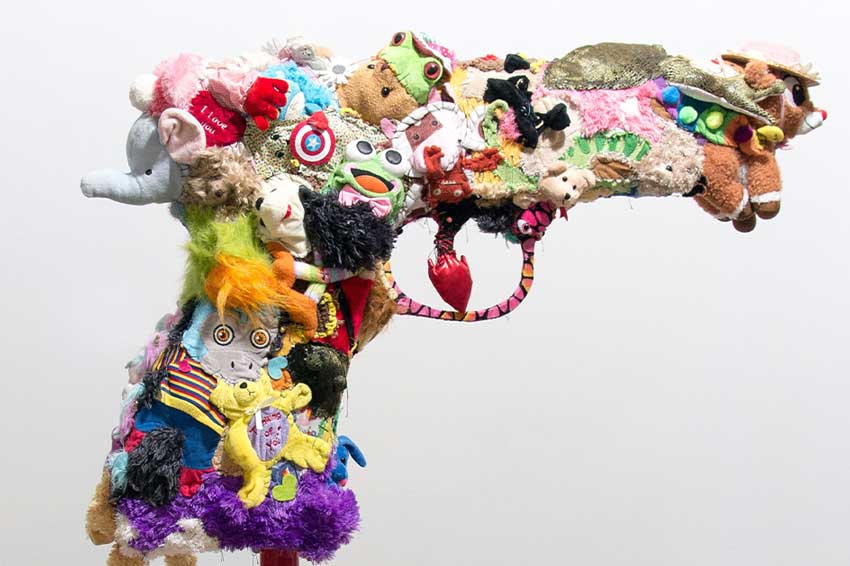 fuzzy firearm made from stuffed animals