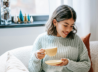hygge aesthetic woman drinking coffee